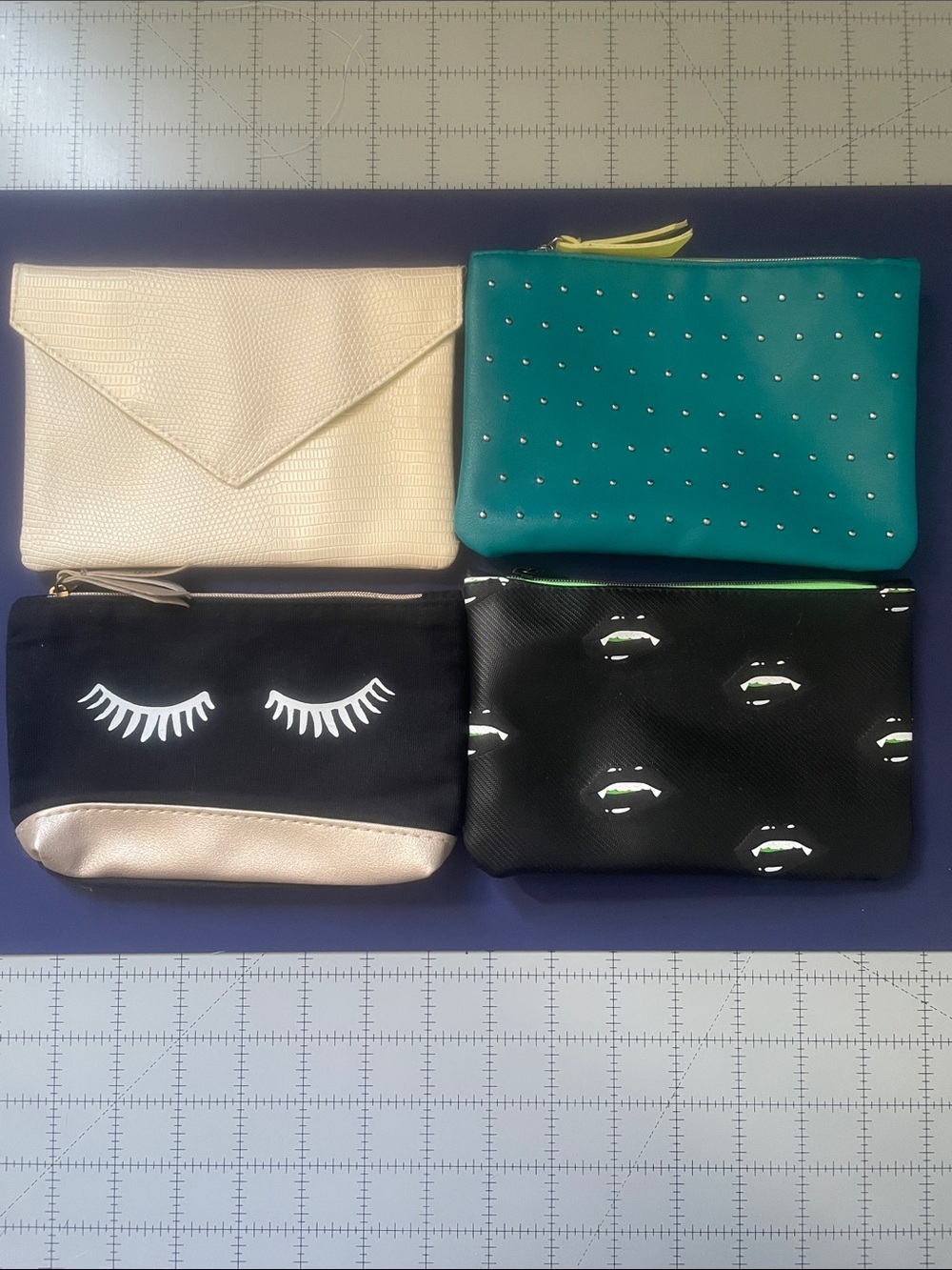 Set of 4 Women's Cosmetic Pouches - Teal, Black, Cream, Black/Gold Accents